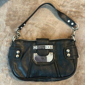 Unsure if it’s genuine leather there isn’t a tag that says it’ isn’t